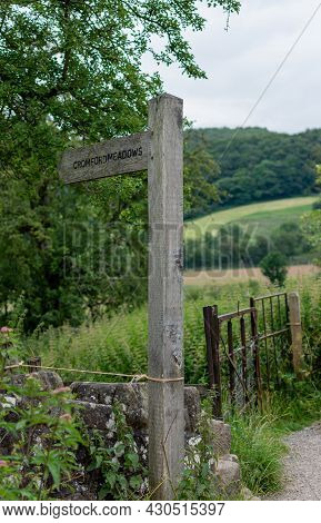 A Sign Post Showing The Way To Cromford Meadows Along Cromford Canal To High Peak Junction