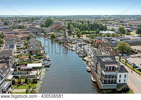 Aerial from the city Bodegraven in the Netherlands at the river The Oude Rijn