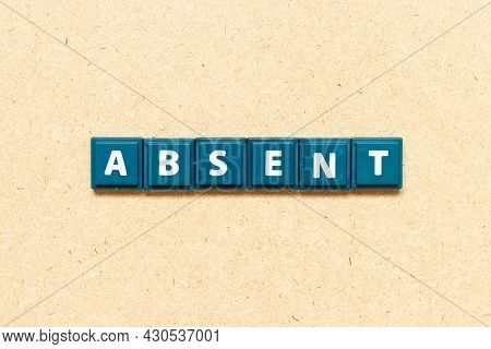 Tile Alphabet Letter In Word Absent On Wood Background