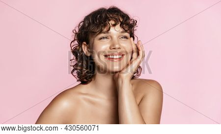 Smiling Sensual Woman With Curly Natural Hair, Glowing Face And Healhy Skin, Shiny Body After Shower