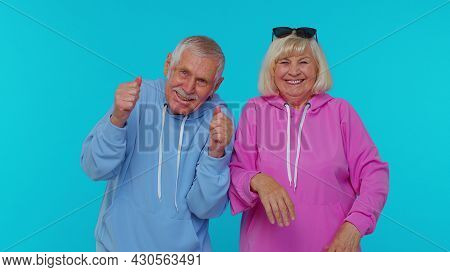 Elderly Gray-haired Stylish Grandfather Grandmother Laughing Out Loud After Hearing Ridiculous Anecd