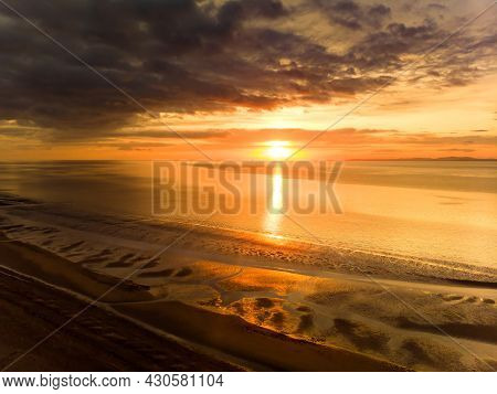 Beautiful Sunset Colors Over The Coastline Of Allerdale District In Cumbria, Uk. Sun Setting Over Th