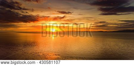 Beautiful Sunset Colors Over The Coastline Of Allerdale District In Cumbria, Uk. Sun Setting Over Th