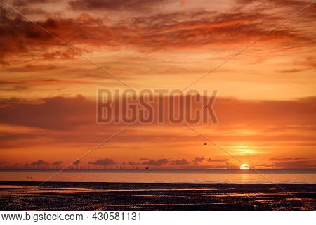 Beautiful Sunset Colors Over The Coastline Of Allerdale District In Cumbria, Uk. Sun Setting Over Th