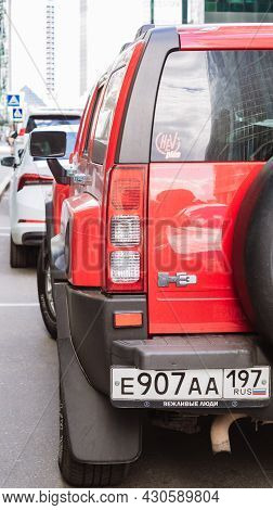 Moscow, Russia - August 2021: Rear View Of Hummer H3 Suv Car In Red Color