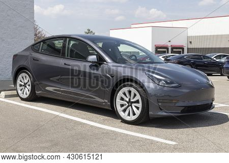 Indianapolis - Circa August 2021: Tesla Model 3 Ev Electric Vehicle On Display. Tesla Products Inclu