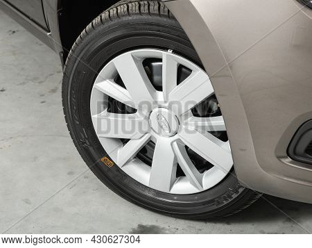 Novosibirsk, Russia - July 21, 2021: Lada Granta,  Close Up Of The Car Front Detail  Wheel