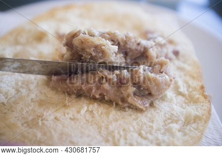 Loin Zurrapa Pate Or Lard With Pork Flakes Been Spreaded By Knife. Selective Focus