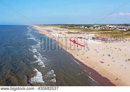 Aerial from the beach in Noordwijk aan Zee in the Netherlands on a beautiful summer day