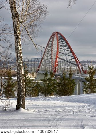 A New Road Bridge With A High Red Cable-stayed Arch Across The Largest River In Siberia In The City 