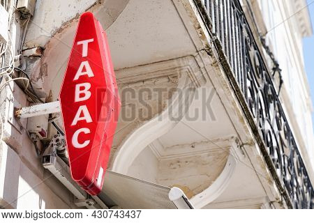 Bordeaux , Aquitaine  France - 08 20 2021 : French Brand Red Shop Tobacco Sign With French White Tex