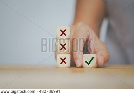 Senior Business Woman Selected Correct Icon On Wooden Cube From Her Experience For Business, Make A 