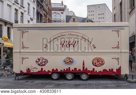 Antwerpen, Belgium - August 1, 2021: Closed Biege Food-trailer Selling Churros, Beignets And Other S