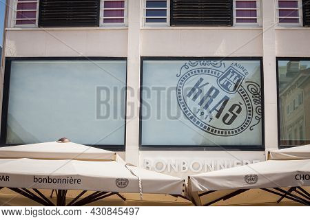 Rijeka, Croatia - June 18, 2021: Kras Logo In Front Og Their Bonbonniere Their Shop In Rijeka. Kras 