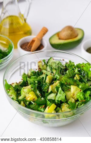 Salad Of Fresh Green Vegetables And Herbs. Cooking Healthy Diet Or Vegetarian Food. Step By Step Rec