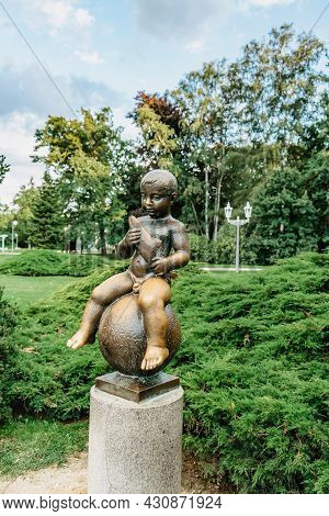 Frantiskovy Lazne, Czech Republic - August 20, 2021.bronze Statue Of Frantisek- Boy With Fish,symbol