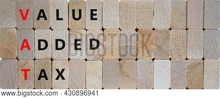 Vat, Value Added Tax Symbol. Wooden Blocks With Concept Words 'vat, Value Added Tax'. Beautiful Wood