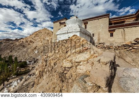 Shey palace and whitewashed chorten in Ladakh, India
