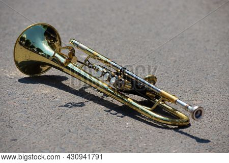 Playing A Brass Instrument. Military Band Performs At The Festival