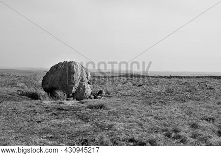 Monochrome View Of A Large Old Boulder Or Standing Stone On Midgley Moor In West Yorkshire Known As 