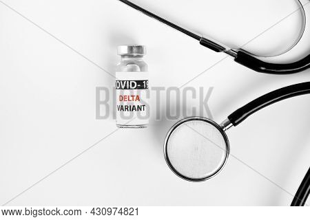 Vaccine bottles covid - 19 delta variant, vials medicine and syringe injection isolated on white. Coronavirus DELTA 2019-ncov.