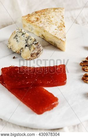 Slice Of Blue Aged Stilton Cheese Accompanied With Quince Marmalade Or Jelly Or Jam Spanish Dulce De