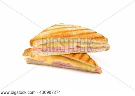 Pressed And Toasted Sandwich With Ham And Cheese On White Background