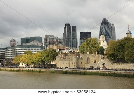 Tower Of London And Modern London City Office Skyline By River Thames