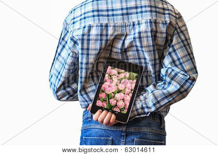 boy holding tablet computer behind his back
