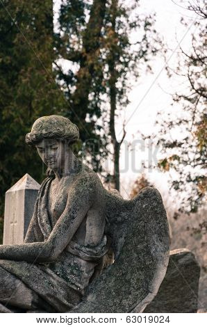 Old Statue Of Angel On The Graveyard