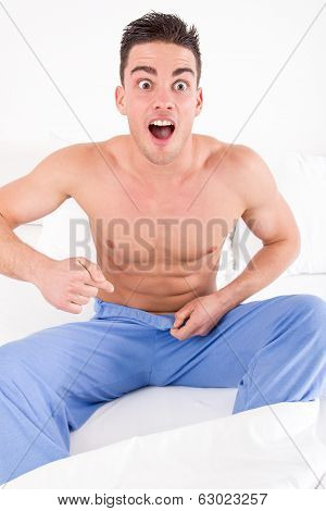 Handsome Half Naked Man Having Problems With Genitals And Potency