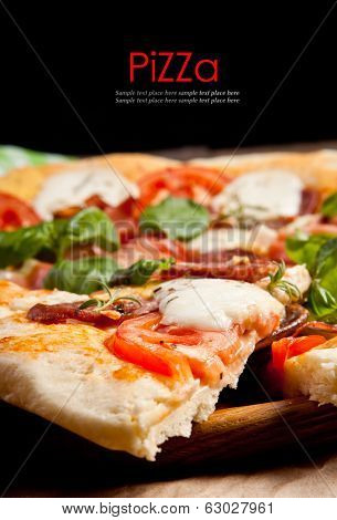 Italian pizza served on wooden table