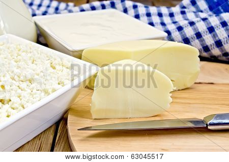 Cheese Suluguni With Curd And Sour Cream On Board