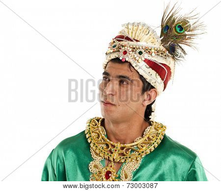 Young indian male in dhoti dress, isolated on white background