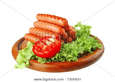 Salsichas vermelhas no prato de carne