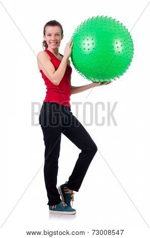 Young woman exercising with swiss ball