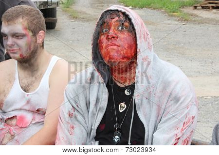 MUSKOGEE, OK - Sept. 13: A bloody zombie looks for runners during the Castle Zombie Run at the Castle of Muskogee in Muskogee, OK on September 13, 2014. 