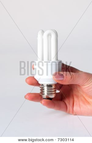 Ruka držící lampa