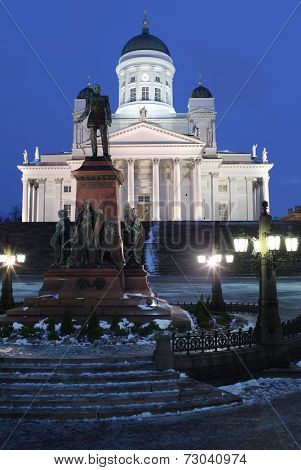 HELSINKI, FINLAND - JANUARY 12, 2012: Monument to Russian Emperor Alexander II against Helsinki Cathedral. The statue, erected in 1894, commemorated his re-establishment the Diet of Finland in 1863
