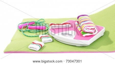 Sport requisites on a carpet isolated on white