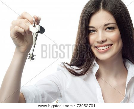 closeup portrait of attractive  caucasian smiling woman brunette isolated on white studio shot  toothy smile face  head and shoulders looking at camera  businesswoman keys hypothec real estate