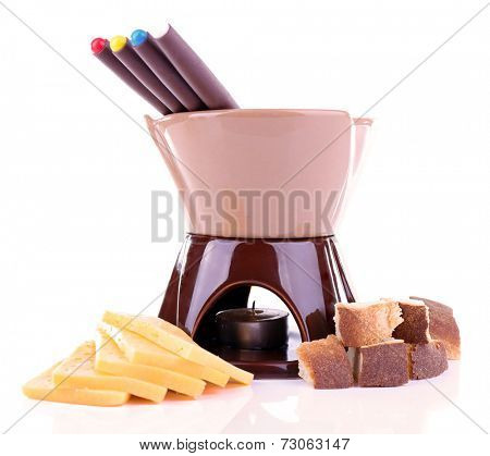 Fondue, rusk and slices of cheese isolated on white