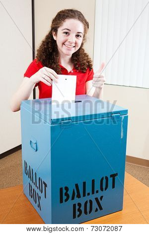 Pretty 18 year old hispanic American girl voting for the first time.  