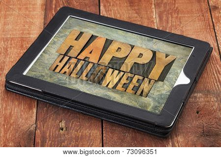 Happy Halloween typography - letterpress  wood type printing blocks on a digital tablet