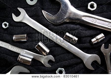 Set of tools on black background