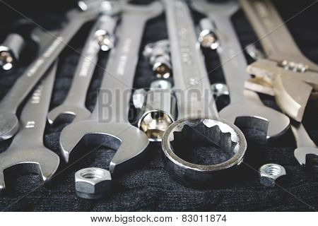 Set of tools on black background