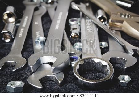 Set of tools on black background