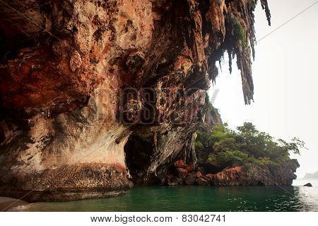 Cliff Under Azure Sea Water