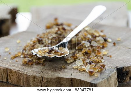 brown cane sugar with silver spoon