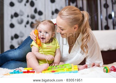 kid girl phone with mother - play with toy phone
